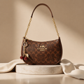 Signature Brown Coach Shoulder Bag with Cherry keychain