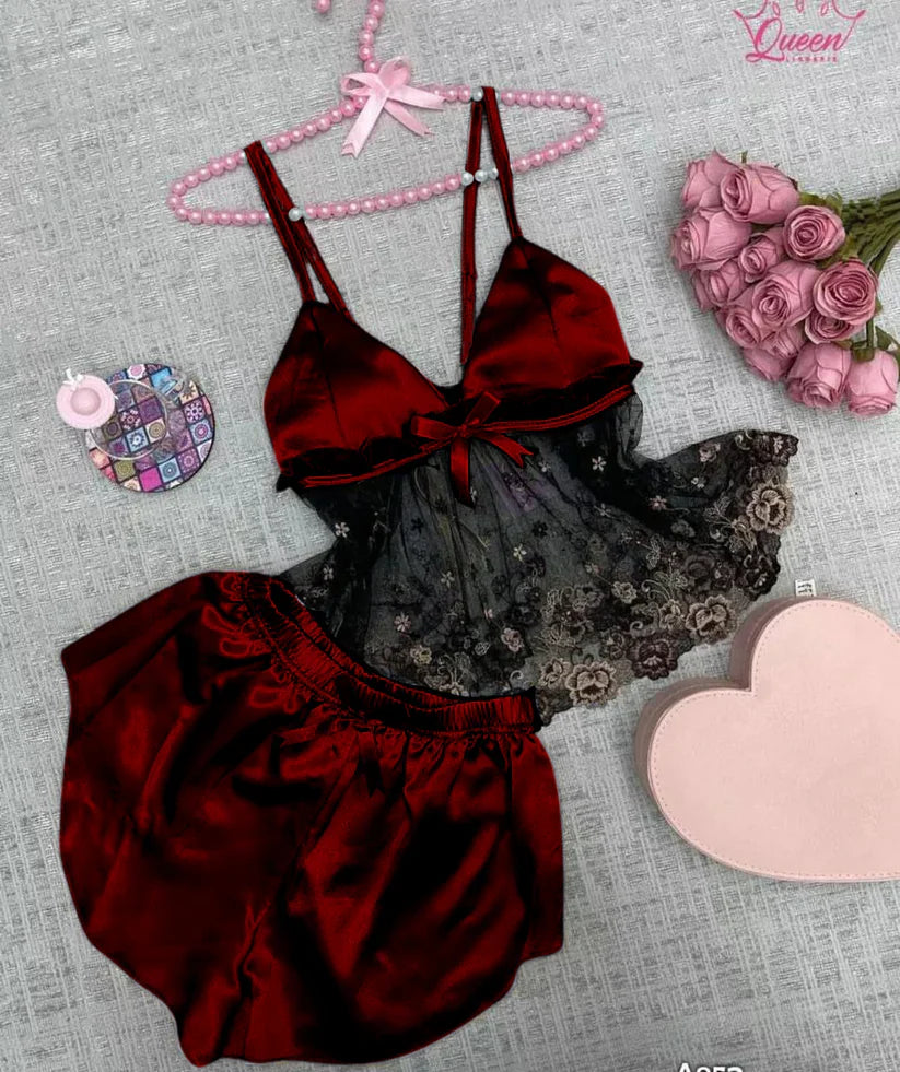 Two-piece satin sleepwear set featuring a lace-trim camisole top with floral embroidery and matching shorts 04