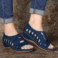 Buckal Wedge Sandals.